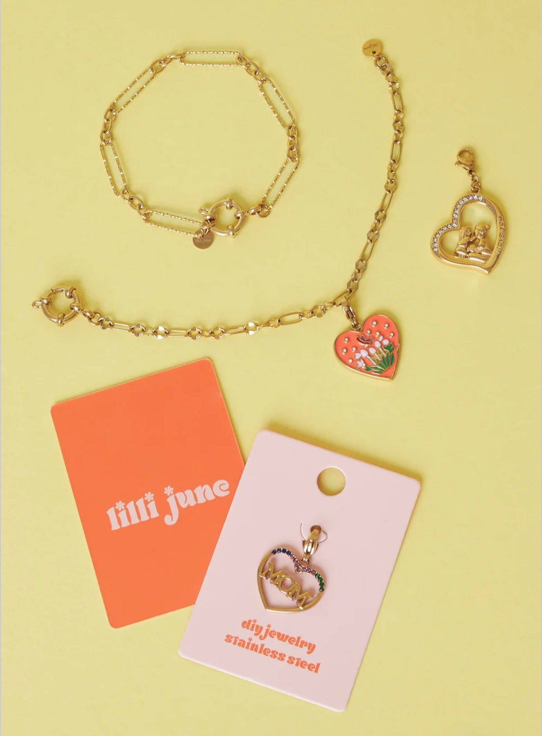 Charm Armband mit Frontverschluss und unterschiedlich langen Gliedern